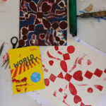 Sample collagraph plate and print with Kulu Mele brochure.